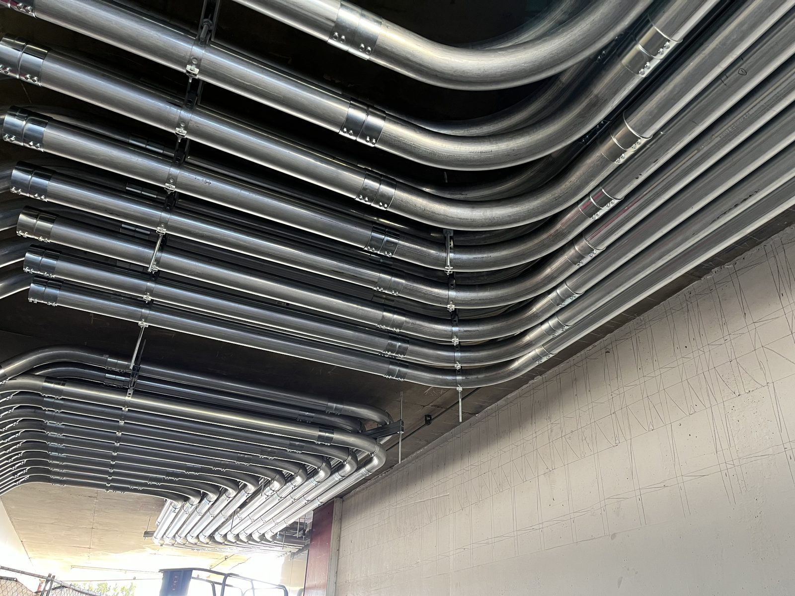 Stacked conduit bank with matched offsets