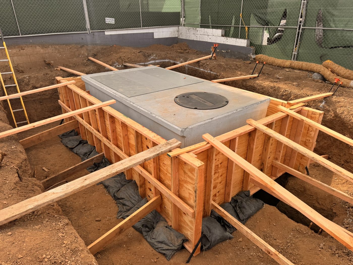 SCE precast vault set in the excavation with forms built around it